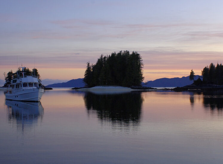 Sunset solitude with Grand Banks and NW Explorations. Fury Cove, Inside Passage, B.C. Jerry and Lois Photography