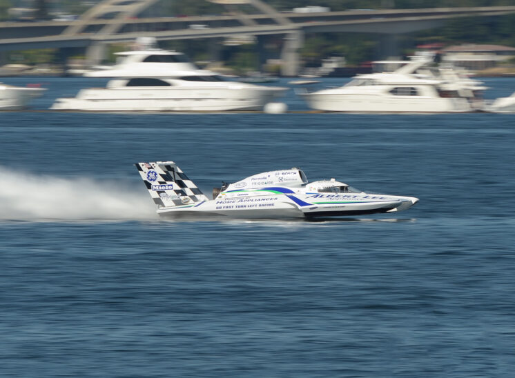 Part of a series during Seattle's Seafair, a speeding hydroplane races by, tack-sharp against motion-blurred surroundings. © Jerry and Lois Photography, all rights reserved